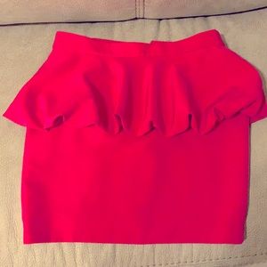 Pink short skirt with ruffles